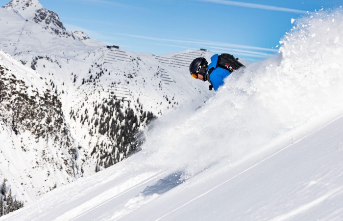 skier skiing powder snow