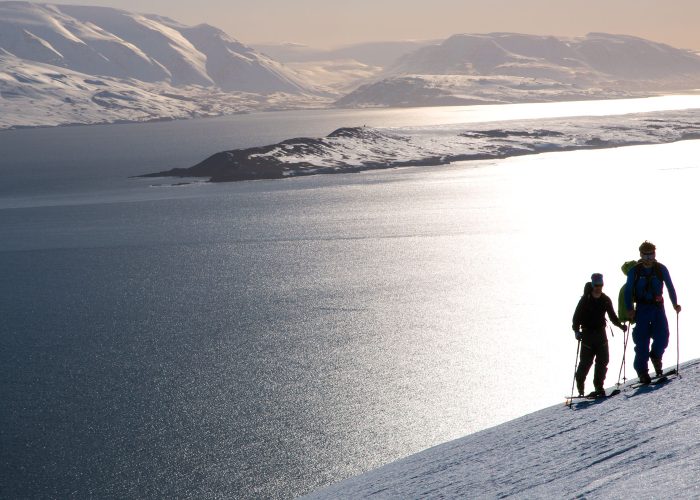 ski tourers in Norway at sunset