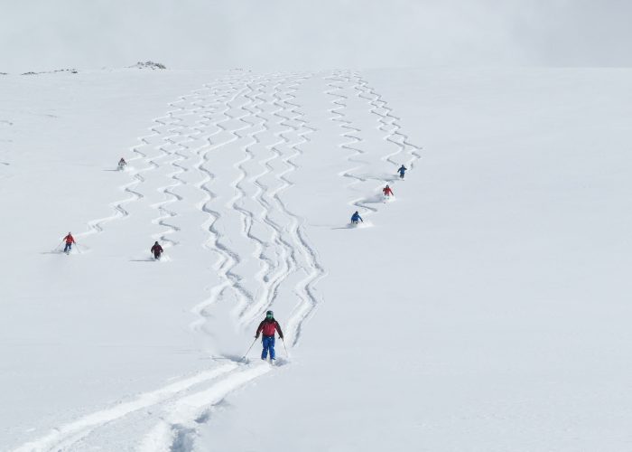 skiers leaving fresh tracks