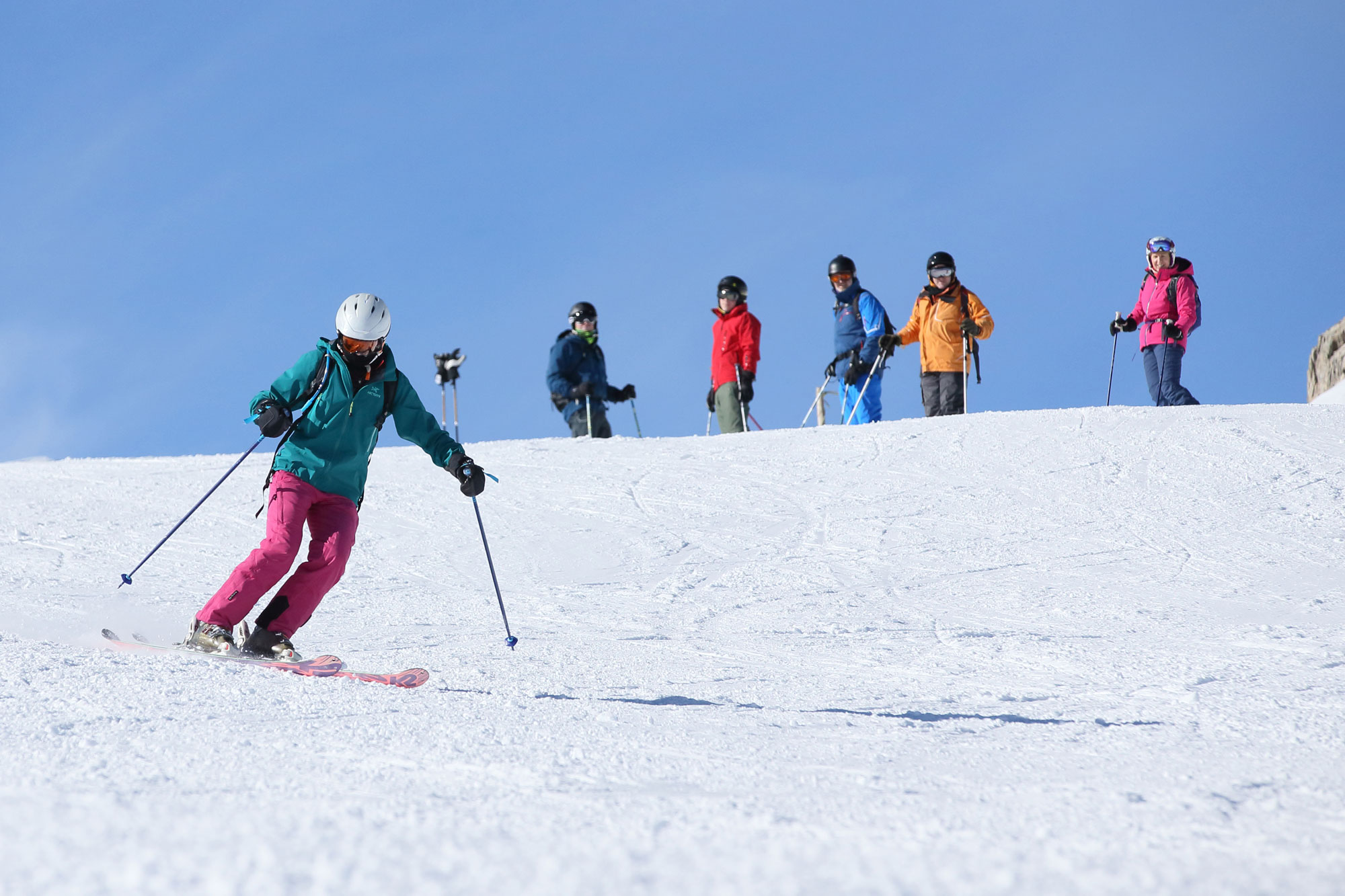 Skier skiing drills on-piste