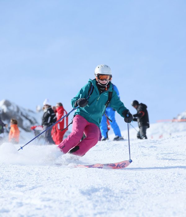 Skier skiing drills on-piste